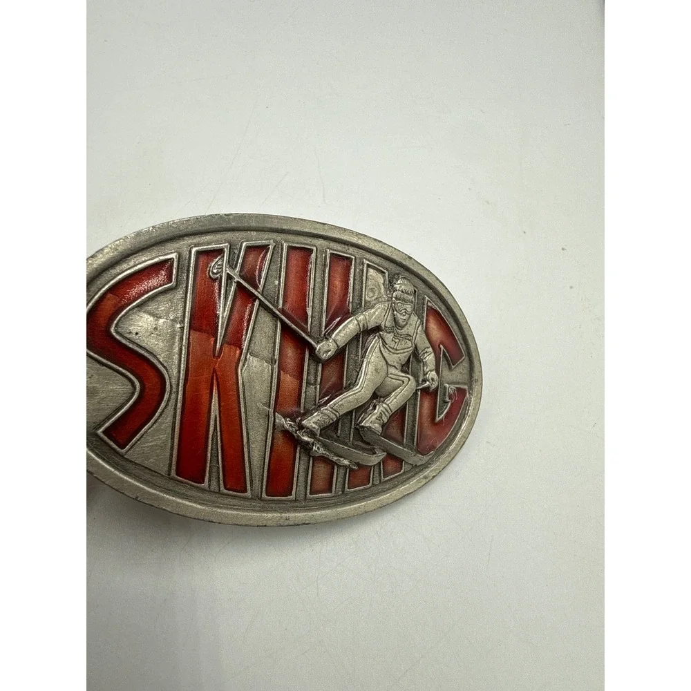 Vintage 1976 Bergamot Brass Works Skiing Belt Buckle Red Enamel Skier‎ I-85